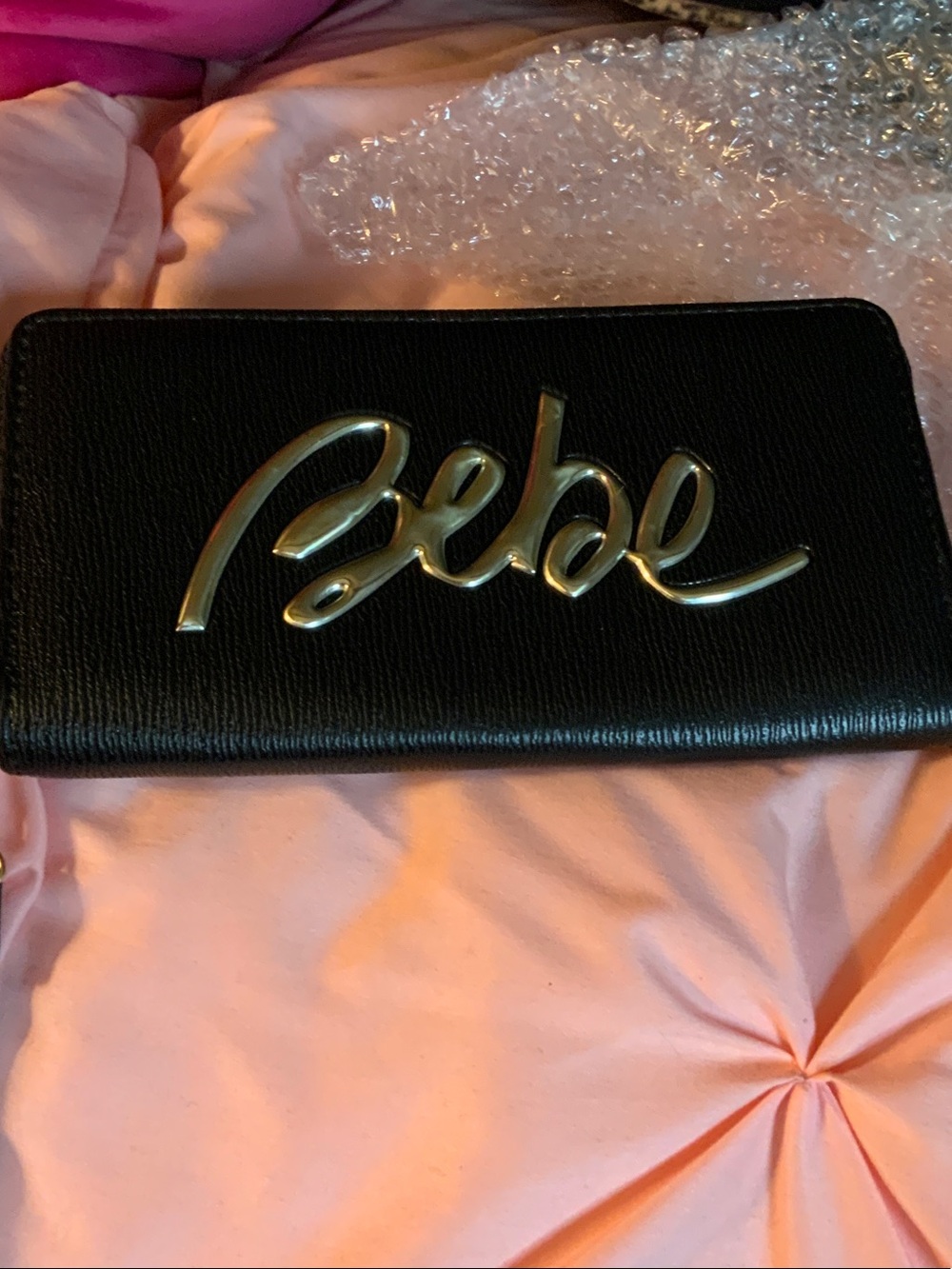 bebe Black Clutch with Gold Script Logo